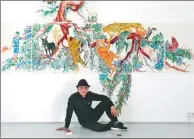  ?? PHOTOS PROVIDED TO CHINA DAILY ?? Left: Artist Wu Junyong in front of his work at the ongoing lation by Liu Zhenchen.