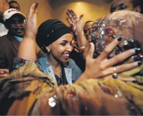  ?? Reuters ?? Democrat Ilhan Omar is greeted by her mother-in-law at her midterm election night party in Minnesota yesterday