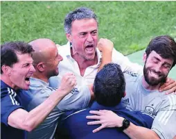  ??  ?? Luis Enrique y su cuerpo técnico celebran el gol de Morata