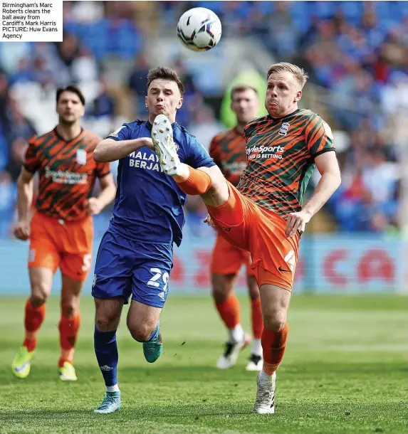  ?? PICTURE: Huw Evans Agency ?? Birmingham’s Marc Roberts clears the ball away from Cardiff’s Mark Harris