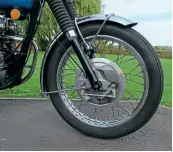  ??  ?? One of the best drum brakes made in the UK, no doubt about that. BSA / Triumph’s group 2ls devices are very good indeed. Observe how the brake plate is not black, which was UK spec for 1974. Export bikes, however…