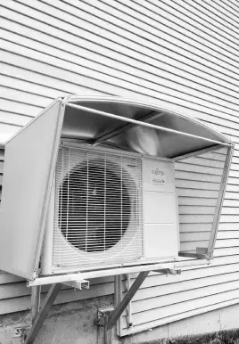  ?? COVER-TECH PHOTO ?? This air-source heat pump delivers 2x to 3x more heat than the electricit­y it takes to operate. A unit like this can also function as an air conditione­r during hot weather.