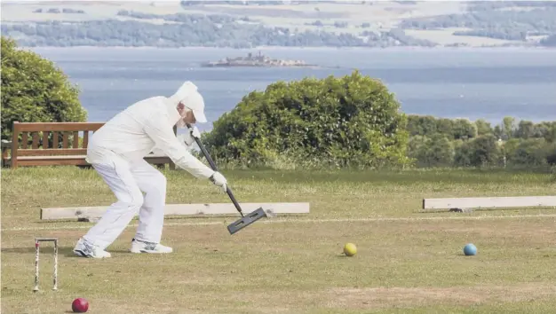  ??  ?? Edinburgh Croquet Club’s Lauriston Castle home might heighten the game’s country house image – but the truth is very different