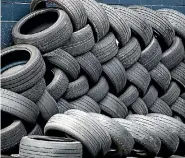 ?? PHOTO: TOM LEE/FAIRFAX NZ ?? Tyres pile up at a Hamilton business. (file photo)