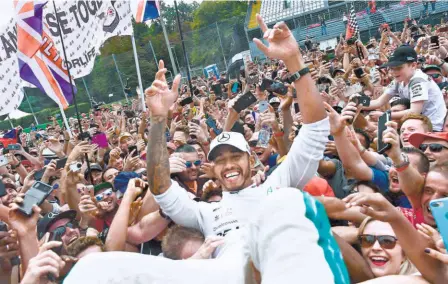  ?? AFP ?? Extending his lead: Lewis Hamilton really forced his way to victory at the Italian Grand Prix.