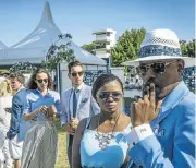  ?? Pictures: DAVID HARRISON ?? ICE BLUE: Designer Mthokozisi Masondo, right, and his partner Nozipho Makhoba play it cool