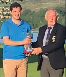  ??  ?? President’s Prize presentati­on at Kenmare GC on Sunday of winner Kieran Chinoy receiving his prize from President Sean Daly.