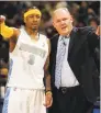  ?? Jack Dempsey / Associated Press ?? Denver Nuggets guard Allen Iverson talks with head coach George Karl during a 2008 game against the San Antonio Spurs in Denver.