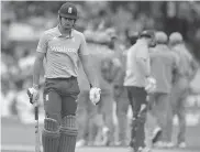  ?? — AFP ?? England’s Alastair Cook walks off after being stumped off the bowling of India’s Ambati Rayudu at Trent Bridge in Nottingham on Saturday.