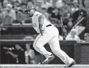  ??  ?? PLAYERS OF THE WEEK
three in a row.
GETTY IMAGES The Texas Rangers’ Prince Fielder hits a single against the Boston Red Sox on Friday. After a miserable season last year, Fielder is on fire, with a .364 average entering Saturday — tops in the AL.