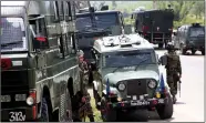  ?? ?? Security personnel patrol near an encounter site where the longest surviving Hizb-ul-mujahideen (HM) commander Ashraf Molvi and other militants were killed at Srichand Top forest area, Pahalgam, in Anantnag on Friday. ANI