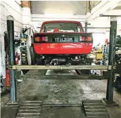  ??  ?? Clockwise, from left: on the ramps at Beech Hill Garage; both the nut and stud were destroyed; original trailing arm was too thin to helicoil