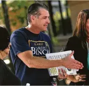  ?? Michael Minasi / Houston Chronicle ?? Gordy Bunch, running for The Woodlands Township Board Position 1, was on hand to greet voters at the polls on Friday.