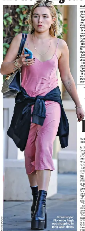  ?? ?? Street style: Florence Pugh out shopping in pink satin dress