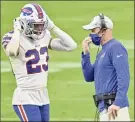  ?? David Becker / Associated Press ?? Head coach Sean Mcdermott, Micah Hyde and the Buffalo Bills are among the nine NFL teams being affected by the coronaviru­s.