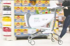  ?? CNW GROUP/SOBEYS INC. ?? Sobeys has rolled out 10 smart shopping carts in its store in the Toronto suburb of Oakville, Ont., on Wednesday.