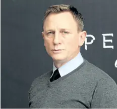  ?? VICTOR CRUZ/GETTY IMAGES ?? Daniel Craig famously complained he’d rather slash his wrists than play James Bond a fifth time. However on August 15 on CBS’s The Late Show, he finally admitted he will reprise the role.