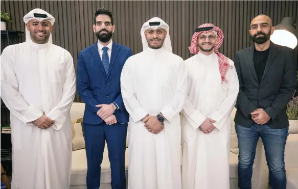  ?? Raha ?? Saleh Al Tunaib, Raha’s co-founder and chief executive, centre. The start-up seeks to expand its robotics and automation consultanc­y business across the Gulf