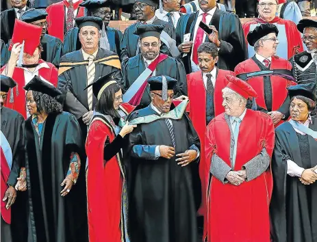  ?? /File picture ?? Vital skills: Health Minister Aaron Motsoaledi attends the graduation of 62 medical students in the South African-Cuban medical training programme at the University of Pretoria. About 720 Cuban-trained students are due to return to SA in July — the biggest group to enrol in the system at one time.