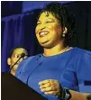  ?? CONTRIBUTE­D ?? Democrat Stacey Abrams will face the winner of today’s GOP runoff in November.