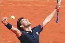  ?? AP ?? Austria’s Dominic Thiem celebrates his win over Japan’s Kei Nishikori during their fourth-round match yesterday.