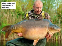  ??  ?? Vinny Parker and Captain Jack at 69lb 10oz.