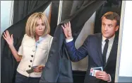  ?? CHRISTOPHE PETIT TESSON / REUTERS ?? French President Emmanuel Macron and wife Brigitte, vote in the first of two rounds of parliament­ary elections in Le Touquet, France, on Sunday.