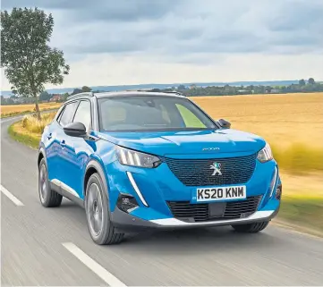  ??  ?? ELECTRIC AVENUE: the Peugeot e-2008 SUV has an official range of around 200 miles.