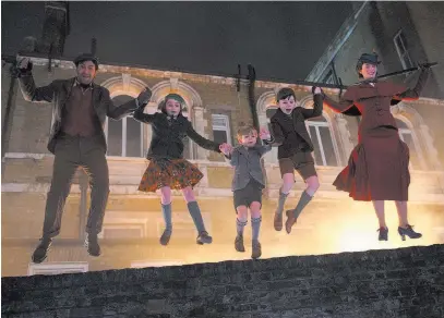  ??  ?? Disney Jack (Lin-manuel Miranda), Annabel (Pixie Davies), Georgie (Joel Dawson), John (Nathanael Saleh) and Mary Poppins (Emily Blunt) in “Mary Poppins Returns.”