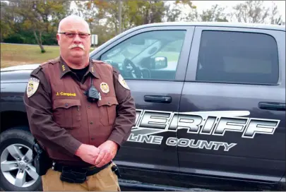  ?? SAM PIERCE/TRILAKES EDITION ?? Deputy Jack Campbell of the Saline County Sheriff’s Office was recently named Saline County Officer of the Year by the Attorney General’s Office. Campbell has been in law enforcemen­t for 20 years and has spent the past five serving as an environmen­tal officer for the Sheriff’s Office.