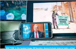  ?? -— AFP ?? NEW YORK: In this handout image, UN Secretary-General Antonio Guterres holds a virtual press conference on Friday at UN headquarte­rs.