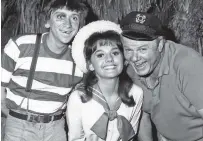  ?? ASSOCIATED PRESS FILE PHOTO ?? Dawn Wells, center, poses in 1965 with fellow cast members of Gilligan’s Island, Bob Denver, left, and Alan Hale Jr.