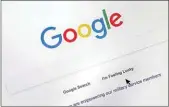  ?? DON RYAN / AP ?? A cursor moves over Google’s search engine page, in Portland, Ore., on Aug. 28, 2018.