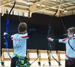  ?? Picture: Charlotte Hicks ?? ON TARGET: Finlay (left) and Oliver Hicks at their archery club, Bowmen of Warfield