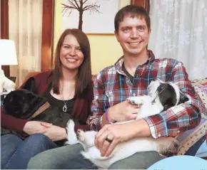  ?? RICK WOOD / MILWAUKEE JOURNAL SENTINEL ?? Jessi Cook, a nurse from Edgerton, has supported the recovery of her husband, Brandon Cook, a former heroin addict. Brandon also credits his therapist as well as an extended residentia­l treatment program. The couple agree that many in Rock County are...