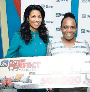  ?? CONTRIBUTE­D ?? Carmen Thompson (right) shares a big smile after being informed that she was one of the winners of the JN Picture Perfect Room Makeover Promotion. Sharing in the moment is Suzanne Hendriks, brand specialist, Jamaica National Group.