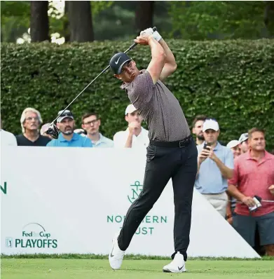  ??  ?? Off it goes: Brooks Koepka hitting a shot from the 17th tee during the second round of the Northern Trust in New Jersey on Friday. — AFP