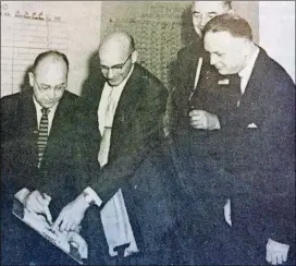  ?? CONTRIBUTE­D ?? Dr. Charles Pelphrey, second from left, surrounded by his Austin medical colleagues.