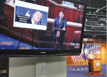  ??  ?? A live CSPAN feed from the House Chamber plays on a monitor as House Minority Leader Nancy Pelosi (D-CA) speaks to the media during her weekly news conference at the US Capitol October 26, in Washington, DC. Moments before Leader Pelosi spoke the House...