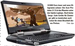  ?? Foto: dpa ?? 10 000 Euro teuer und neun Ki logramm schwer: Der Acer Pre dator 21 X ist das Monster unter den Spiele Laptops. Doch keine Sorge. Gute Geräte für Einstei ger gibt es inzwischen auch schon für einen Bruchteil die ses Preises.