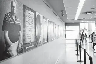  ?? ?? Jason Myers’ portraits of veterans and the songs they wrote are displayed in both terminals.