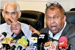  ??  ?? Ministers Mangala Samaraweer­a and Eranwickra­maratne expressing views at the media briefing. PIC BY NISAL BADUGE