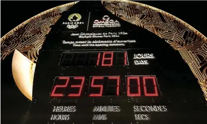  ?? ?? The countdown clock for the Paris Olympics, six months before the Games begin. Photograph: Stéphanie Lecocq/Reuters