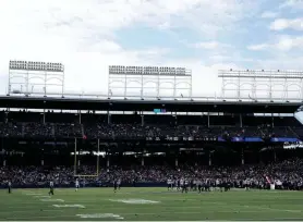  ?? NIKOS FRAZIER/JOURNAL & COURIER/USA TODAY NETWORK ?? Ohio State football will face Northweste­rn at Wrigley Field, seen during a 2021 game between Northweste­rn and Purdue, on Nov. 16.