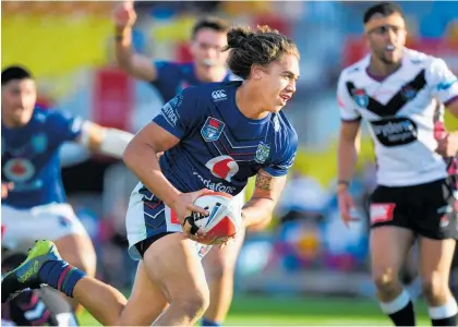  ?? Photo / Photosport ?? Chanel Harris-Tavita is proving a handy fill-in for the Warriors.