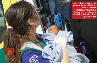  ??  ?? An infant rescued at sea en route to Mater
Dei Hospital yesterday morning Photo: Armed Forces of Malta; Bombardier
Justin Gatt