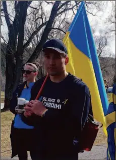  ?? CITIZEN STAFF PHOTO ?? UNBC Timberwolv­es guard Vova Pluzhnikov participat­es in Saturday’s P.G. Solidarity Walk for Ukraine.