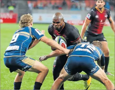  ?? Picture: GALLO IMAGES ?? MOVING TARGET: The Southern Kings’ Luzuko Vulindlu runs into trouble during their Super Rugby match against the Brumbies at the Nelson Mandela Bay Stadium on Saturday