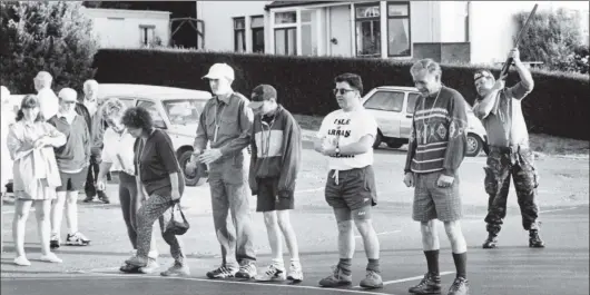  ?? B26twe02 ?? The Arran Hospital Supporters’ League started their annual round Arran walk last Saturday at 6am in Whiting Bay where Maurice Deighton set the runners off with a 12-bore shotgun.