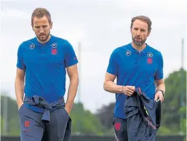  ?? ?? England manager Gareth Southgate, right, and striker Harry Kane